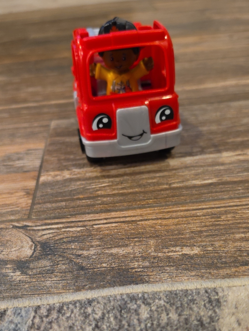 Children's Red Fire Truck Toy with Smiling Face and Figure